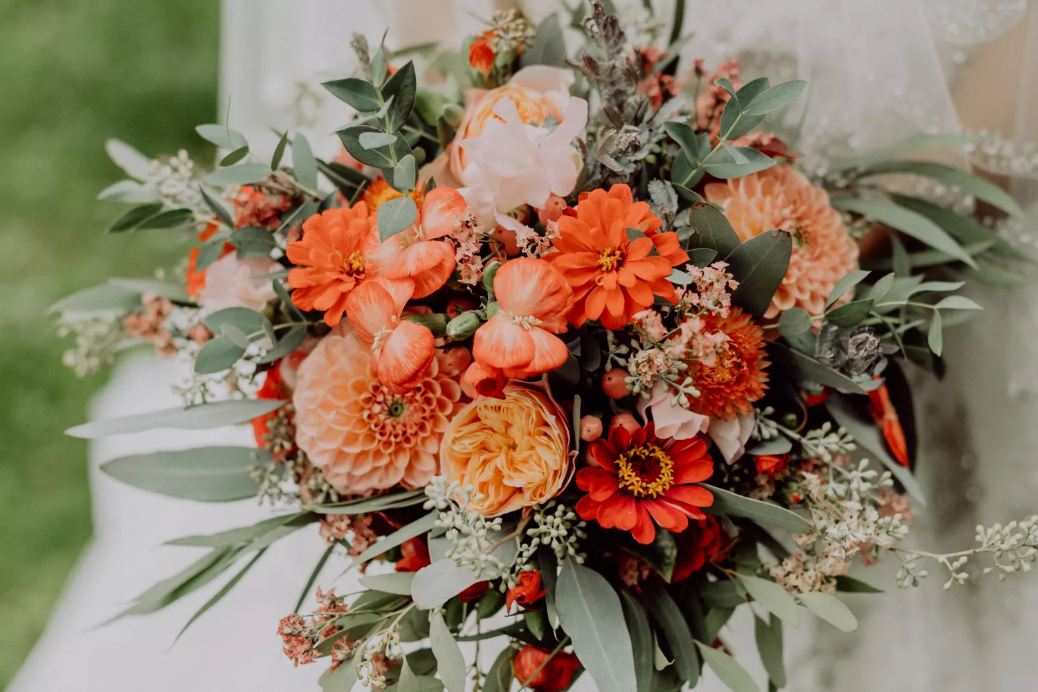 Close-Up Of Bride Holding Flower Bouquet