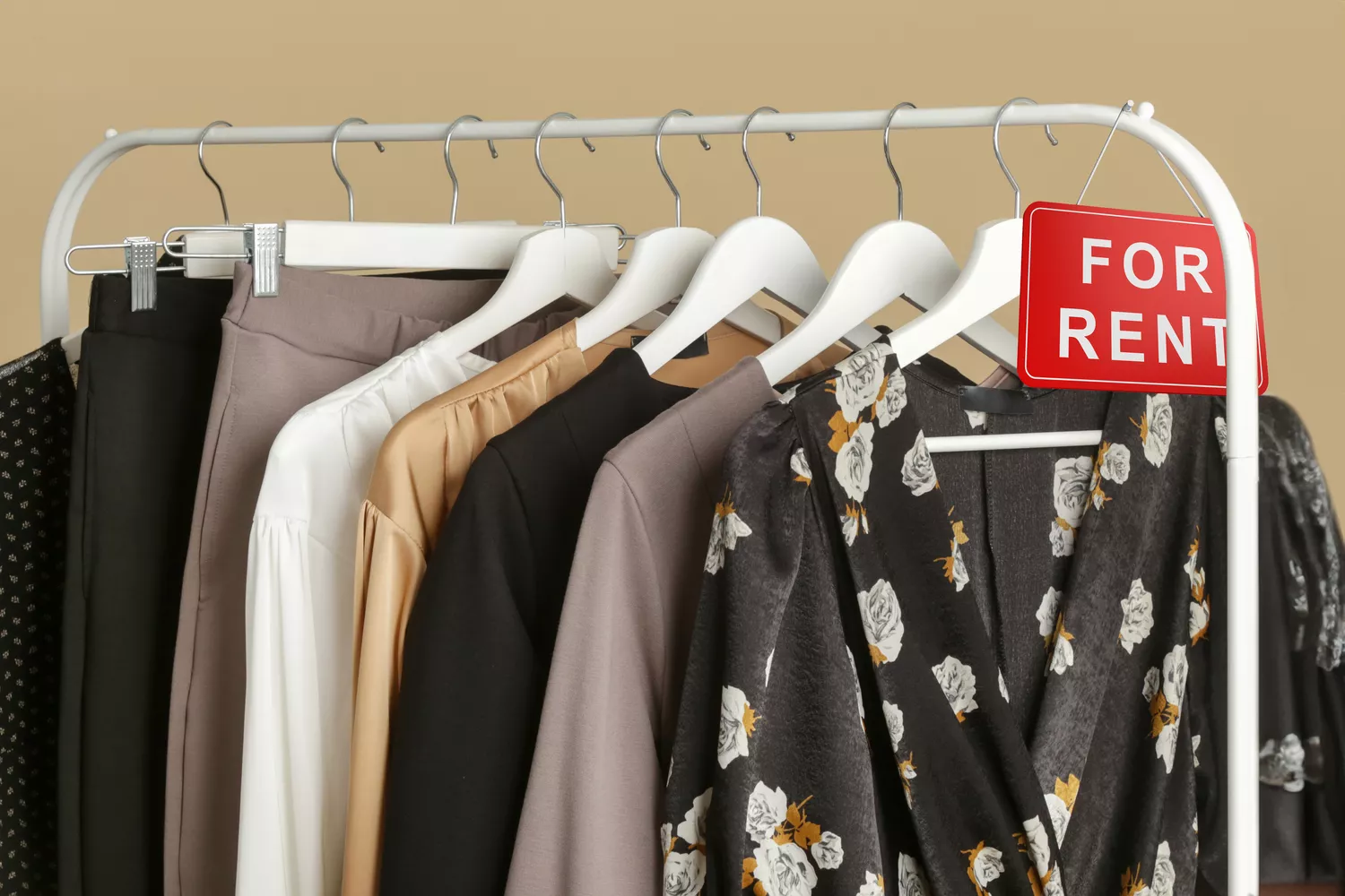 clothing rack with for rent sign